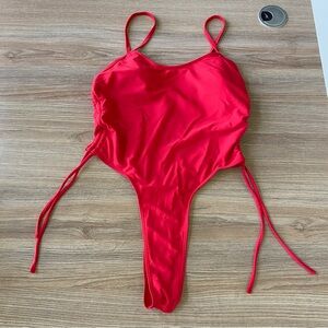 Red one-piece swimsuit with adjustable straps